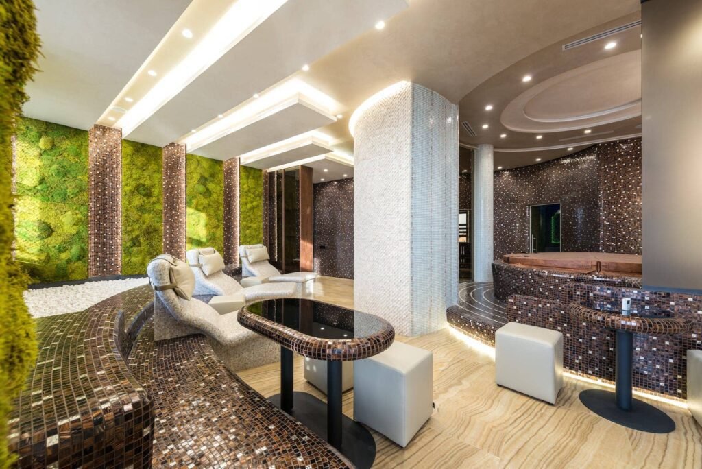 interior of modern luxury spa zone with loungers and bathtubs