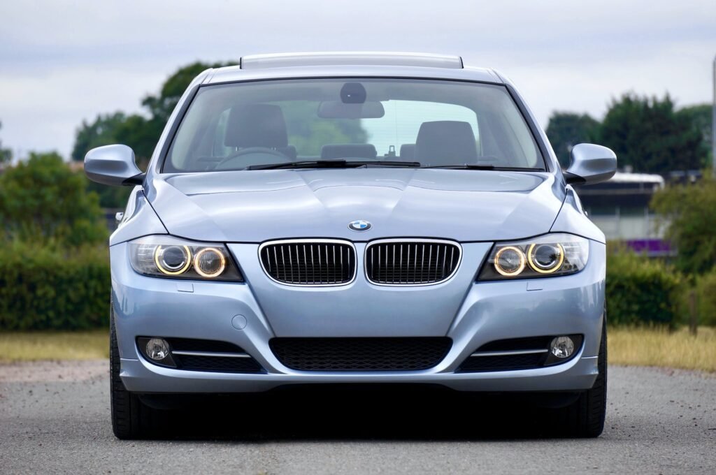 silver bmw car on parking area