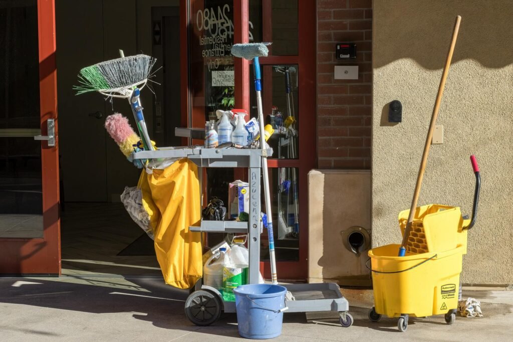 cleaning equipment in front of a building entrance
