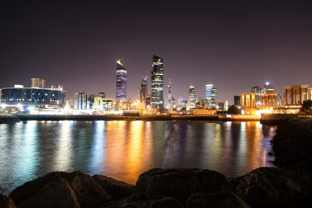 skyscrapers in kuwait city illuminated at night