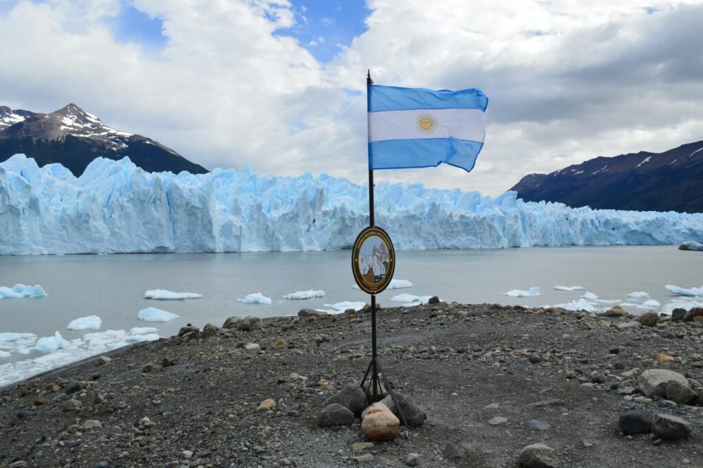 argentina flag with glacier in the background